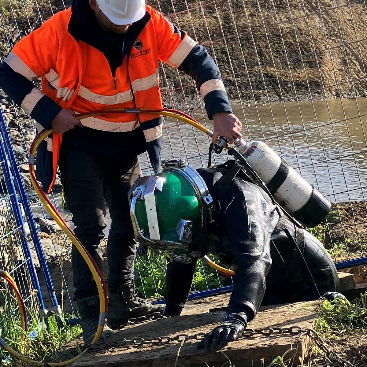 Diver pulls plug on drainage solution